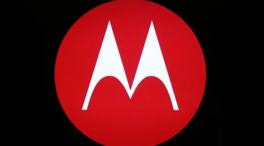 A Motorola Mobility logo is seen on a screen at the public unveiling of their global headquarters in Chicago