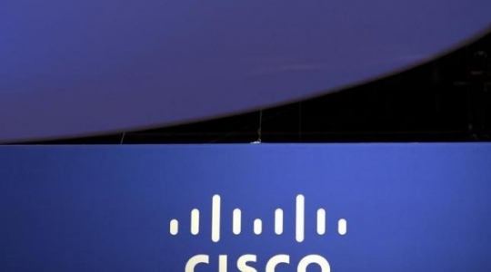 The Cisco Systems logo is seen as part of a display at a technology conference in Chicago, Illinois, May 4, 2015. REUTERS/Jim Young